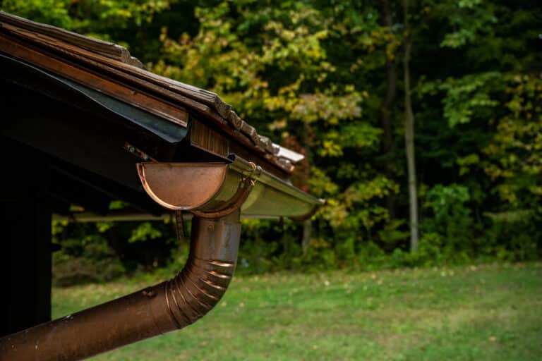 Copper Gutters Along Woodend Shake Roofline